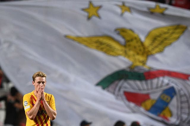 <p>Barcelona’s Frenkie De Jong reacts after Benfica score at the Estadio da Luz  </p>