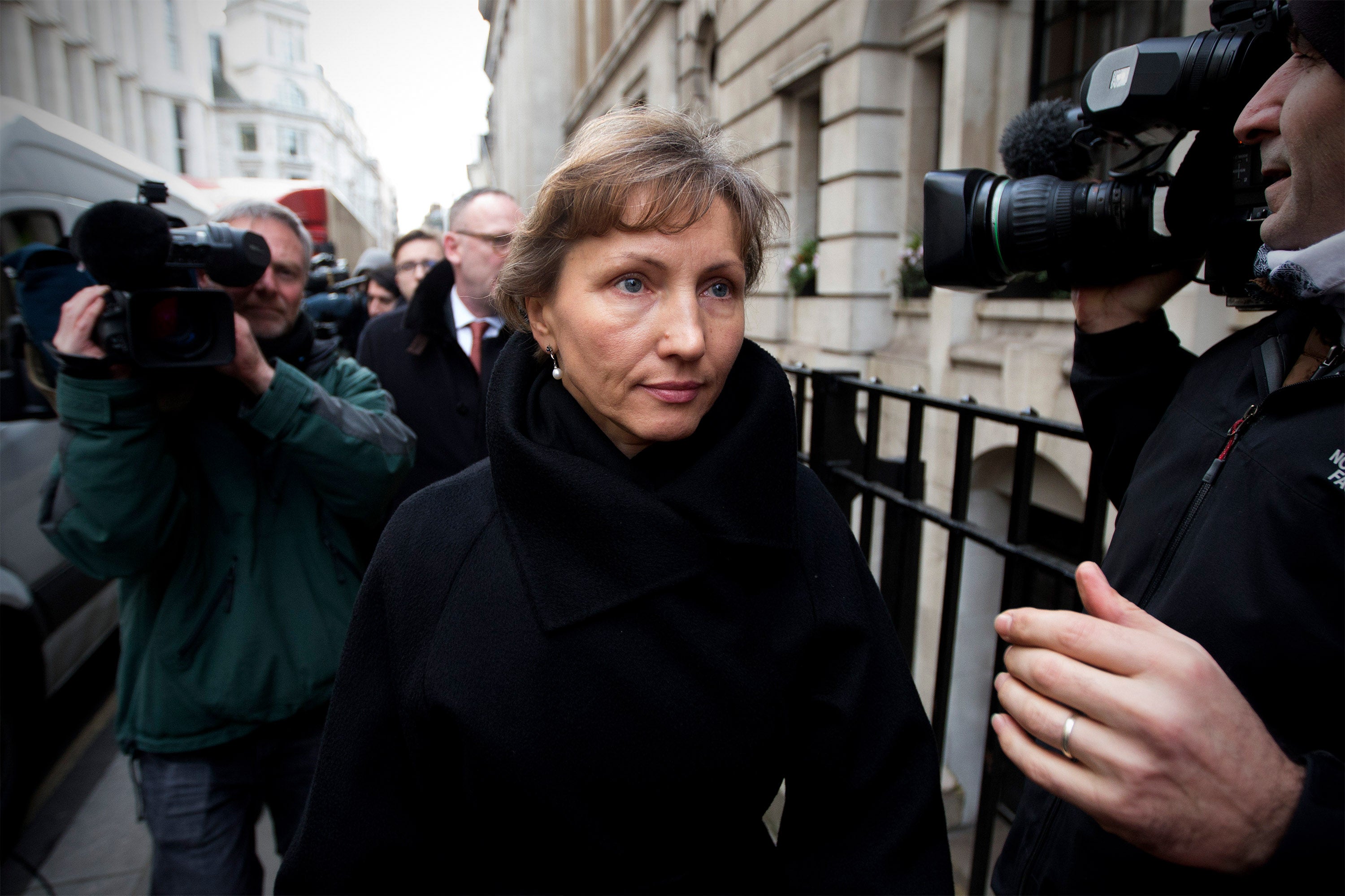 Marina Litvinenko, the widow of former KGB agent Alexander Litvinenko, leaving high court after attending the first day of the inquiry into her husband’s death