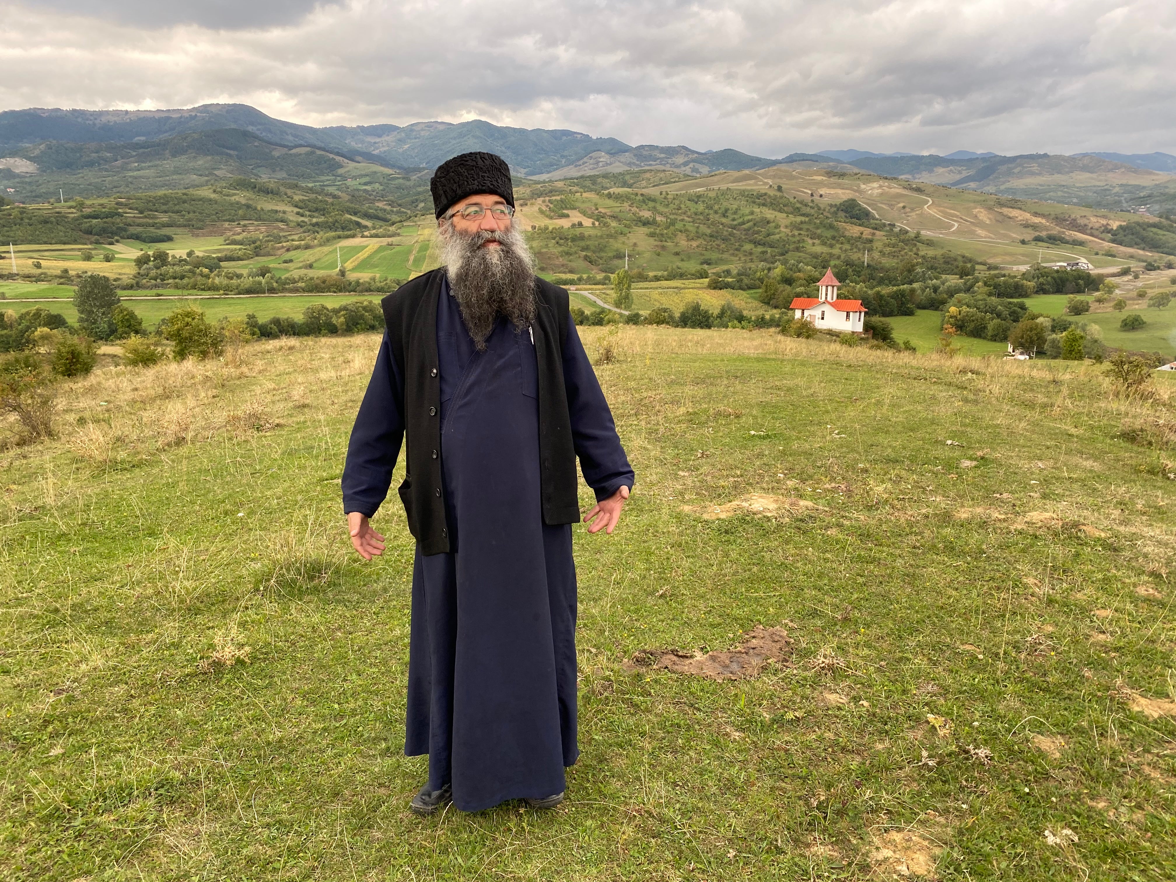 Father Nicolae Tanase, a Romanian Orthodox priest and founder of Pro Vita Association for the Born and Unborn, stands near a shrine dedicated to what he describes as millions of ‘unborn children’ aborted by their mothers