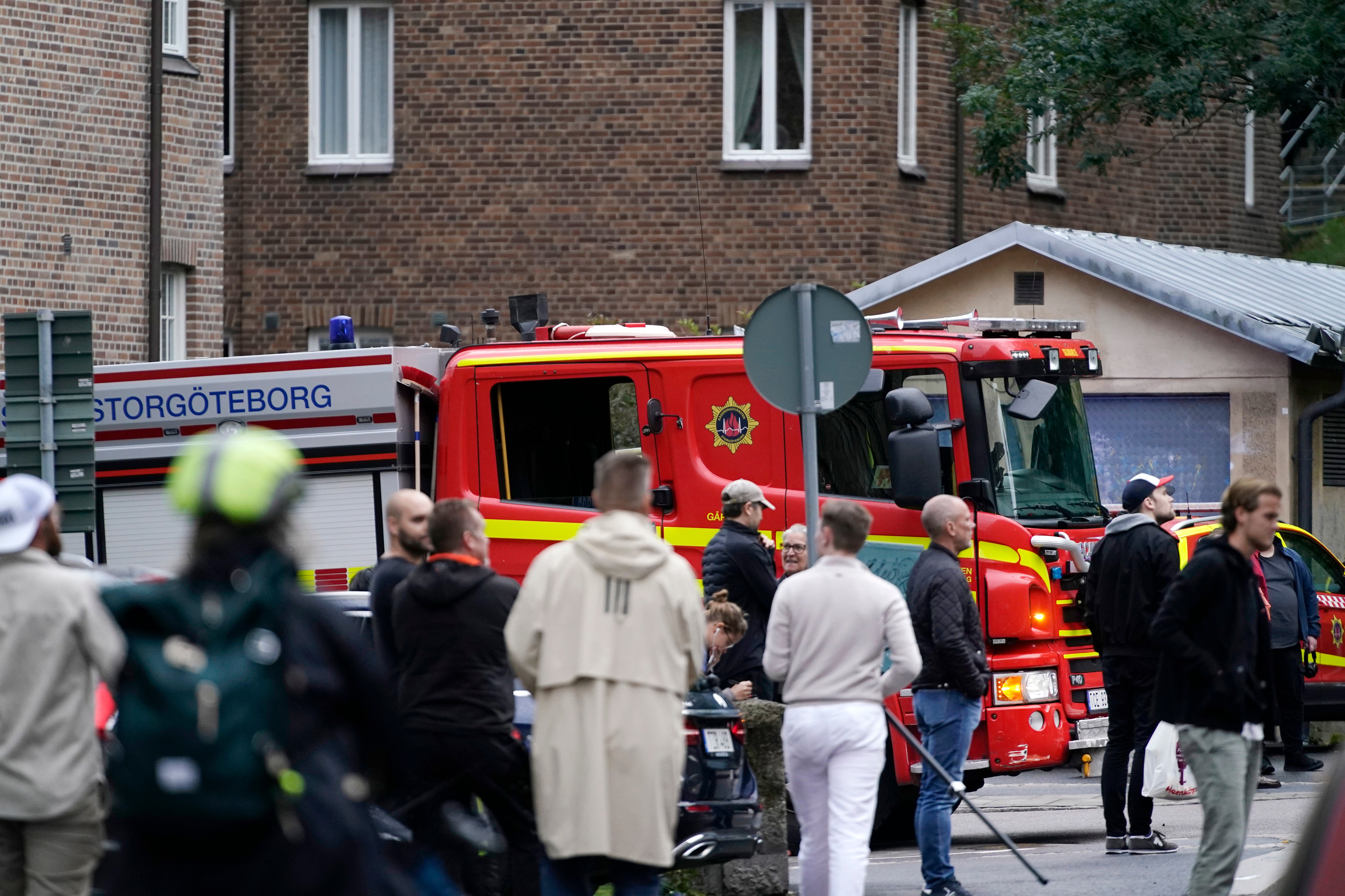 A fire-engine is seen at the area around a health centre that was cordoned off by police in Gothenburg on Thursday