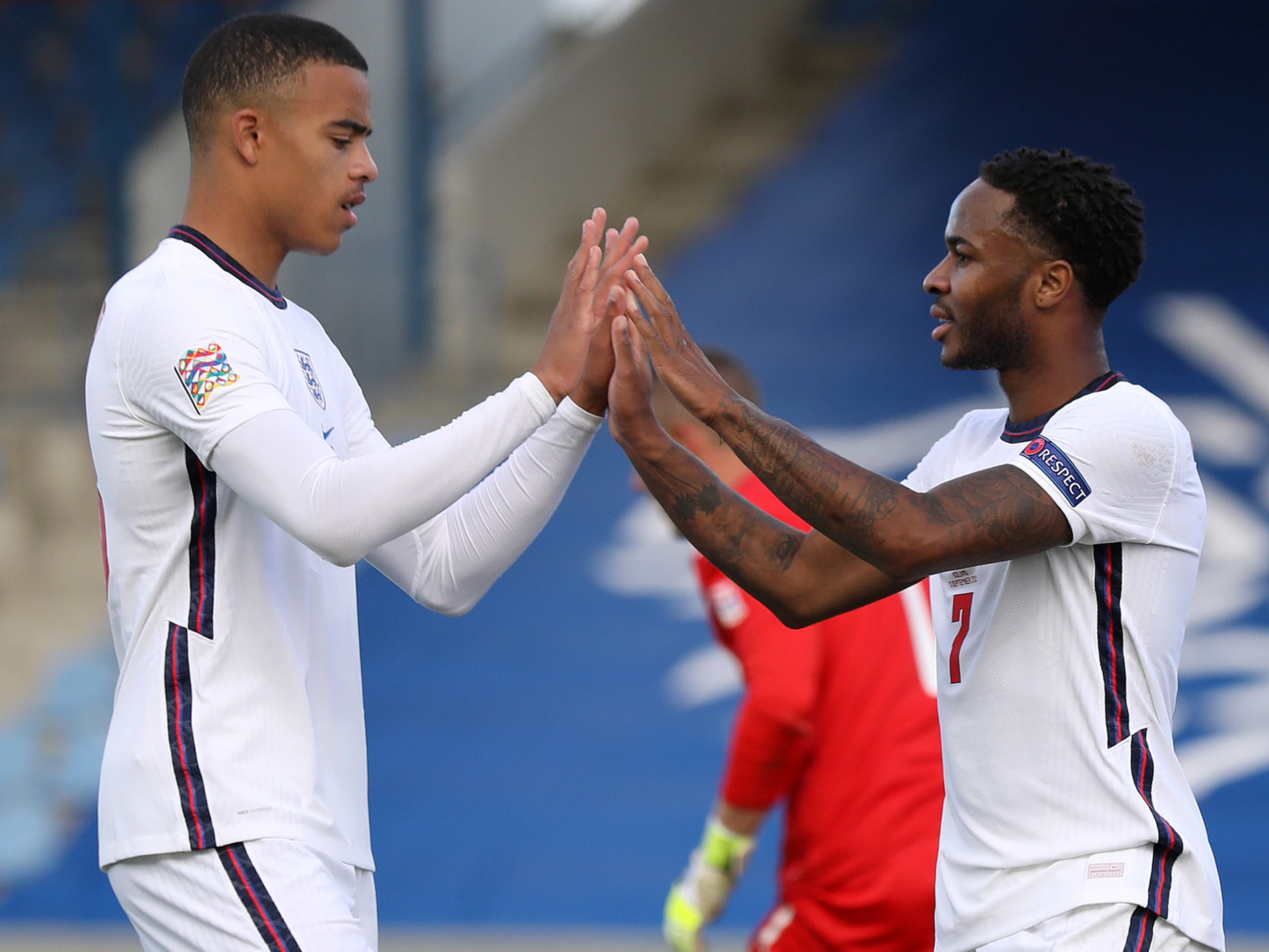 Manchester United and England forward Mason Greenwood with Raheem Sterling