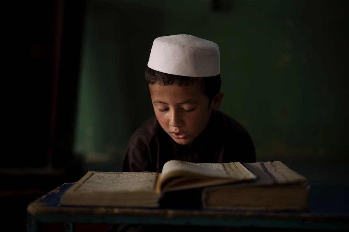 AP PHOTOS: Life in a madrasa as Afghanistan enters new era