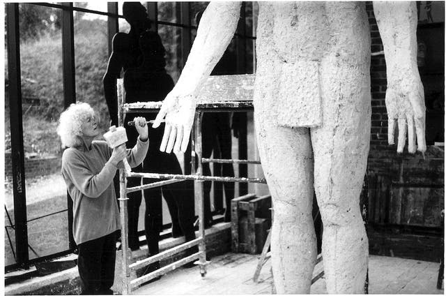 <p>Frink working on her ‘Risen Christ’ sculpture in 1993 </p>