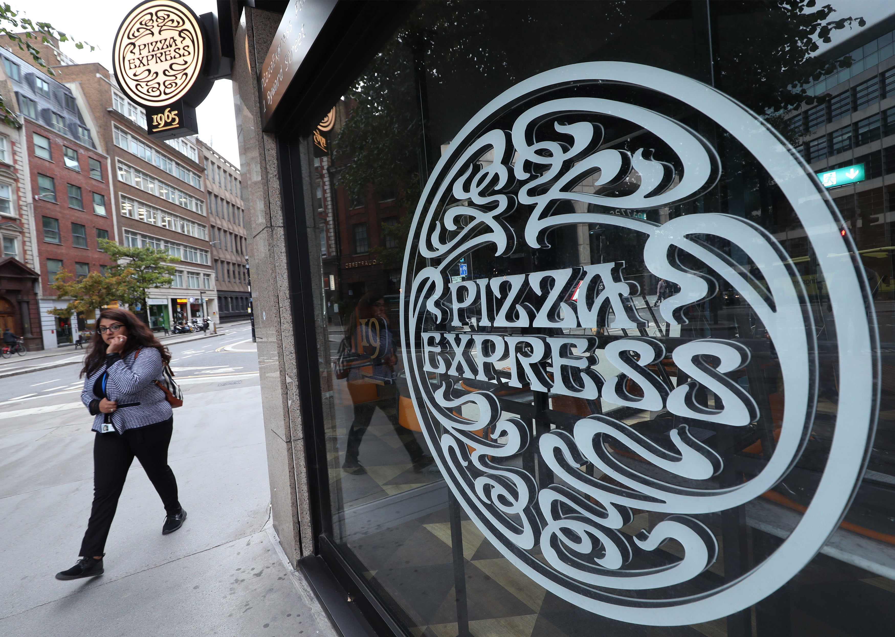 Pizza Express concluded a £335 million refinancing in July (PA)
