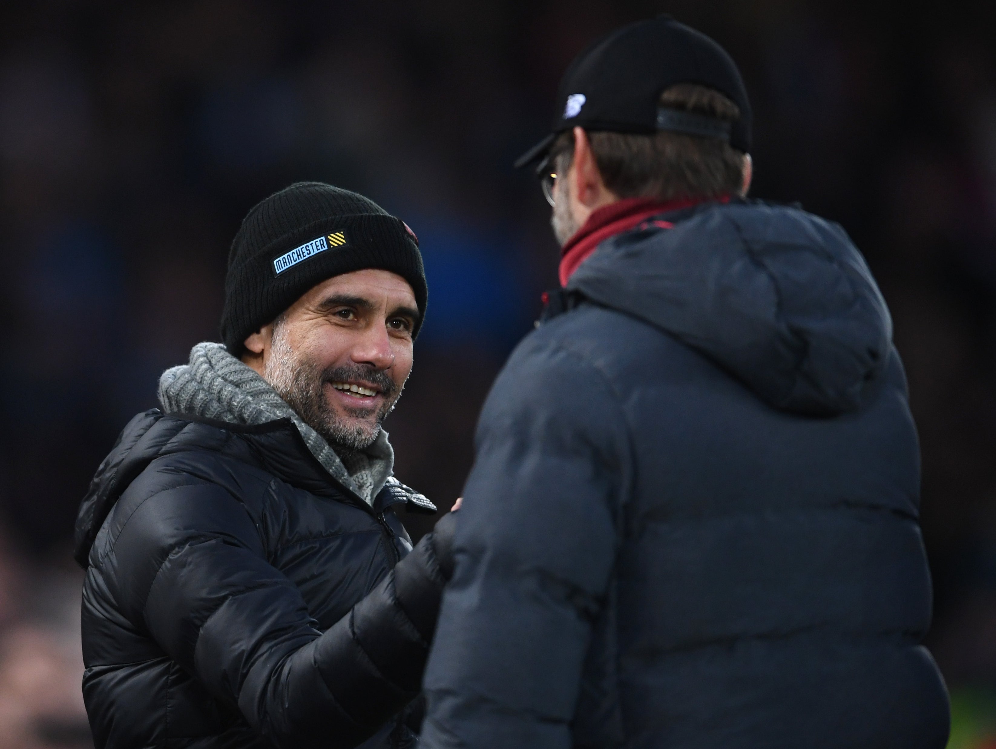 Manchester City manager Pep Guardiola and Liverpool counterpart Jurgen Klopp