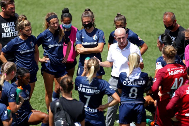 <p>Paul Riley head coach of North Carolina Courage talks with the team after being defeated by the Portland Thorns FC in the quarterfinal match against the Portland Thorns FC in the the NWSL Challenge Cup at Zions Bank Stadium on July 17, 2020 in Herriman, Utah.</p>