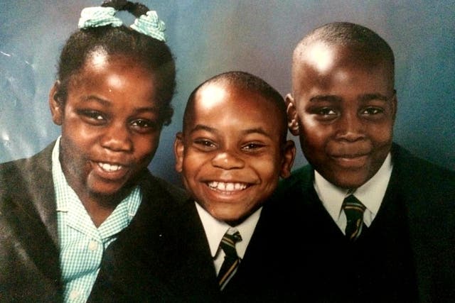 <p>My cousin, brother and I at Theodore McLeary Primary School.</p>