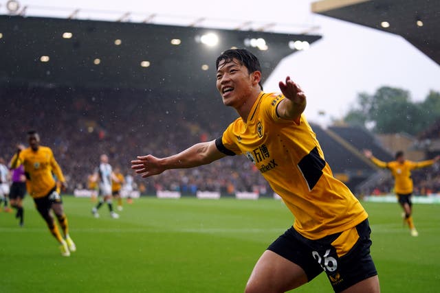 <p>Wolves’ Hwang Hee-chan celebrates his first goal against Newcastle. (Nick Potts/PA)</p>