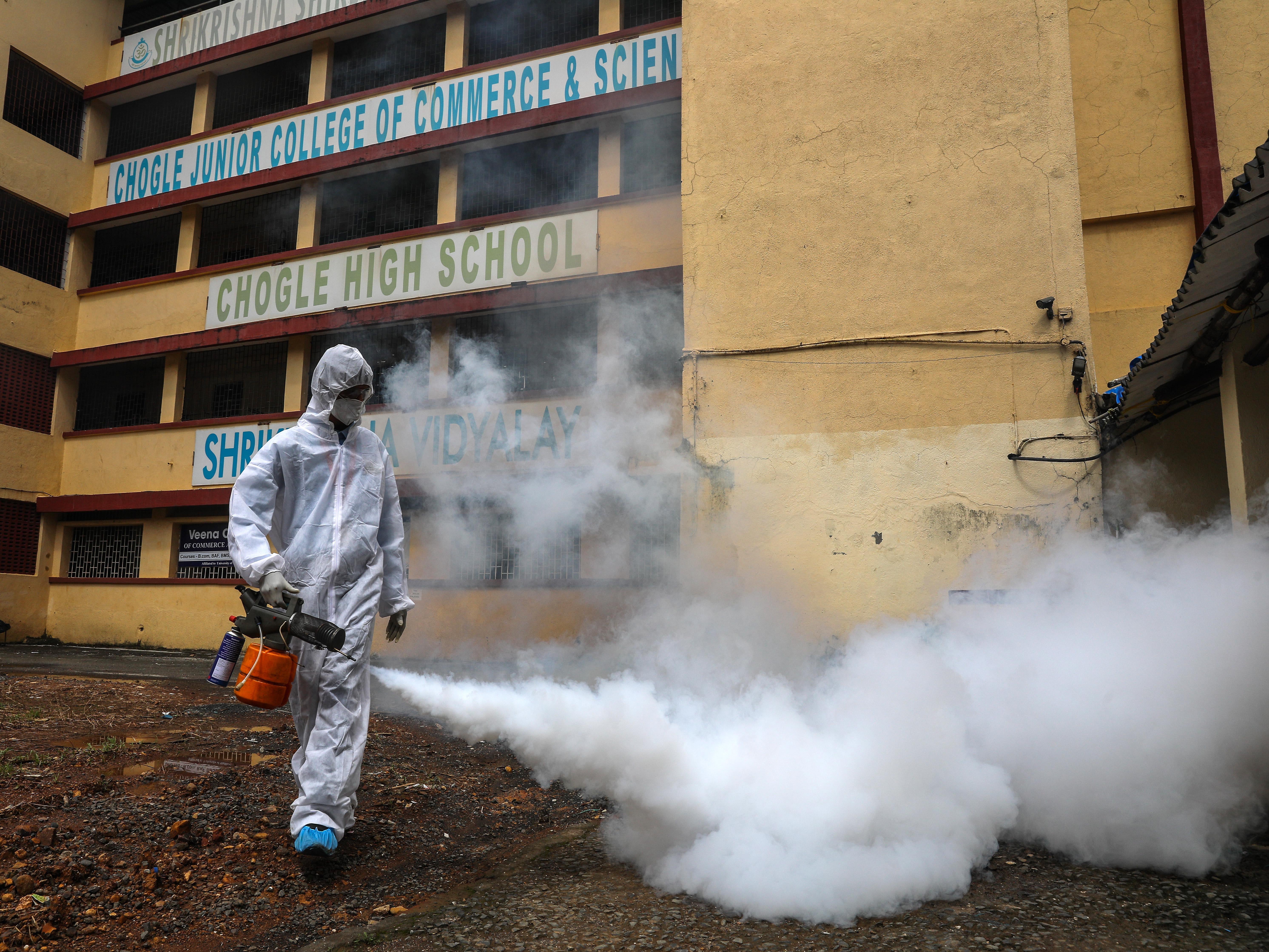 A school in Mumbai is fumigated against Covid-19