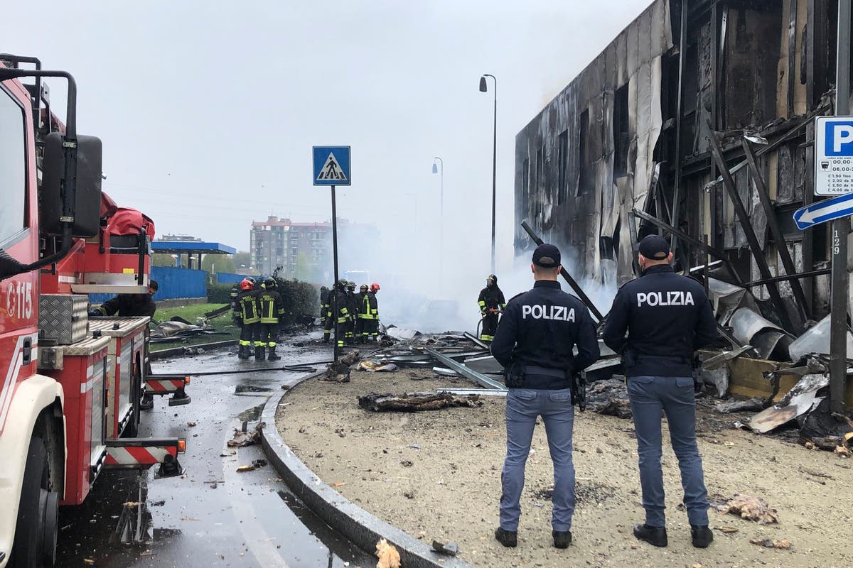 Plane with 6 aboard crashes into vacant building near Milan