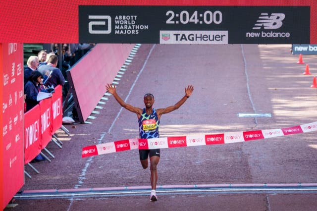 <p>Sisay Lemma from Ethiopia crossing the finish line of the London Marathon</p>