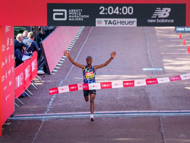 <p>Sisay Lemma from Ethiopia crossing the finish line of the London Marathon</p>