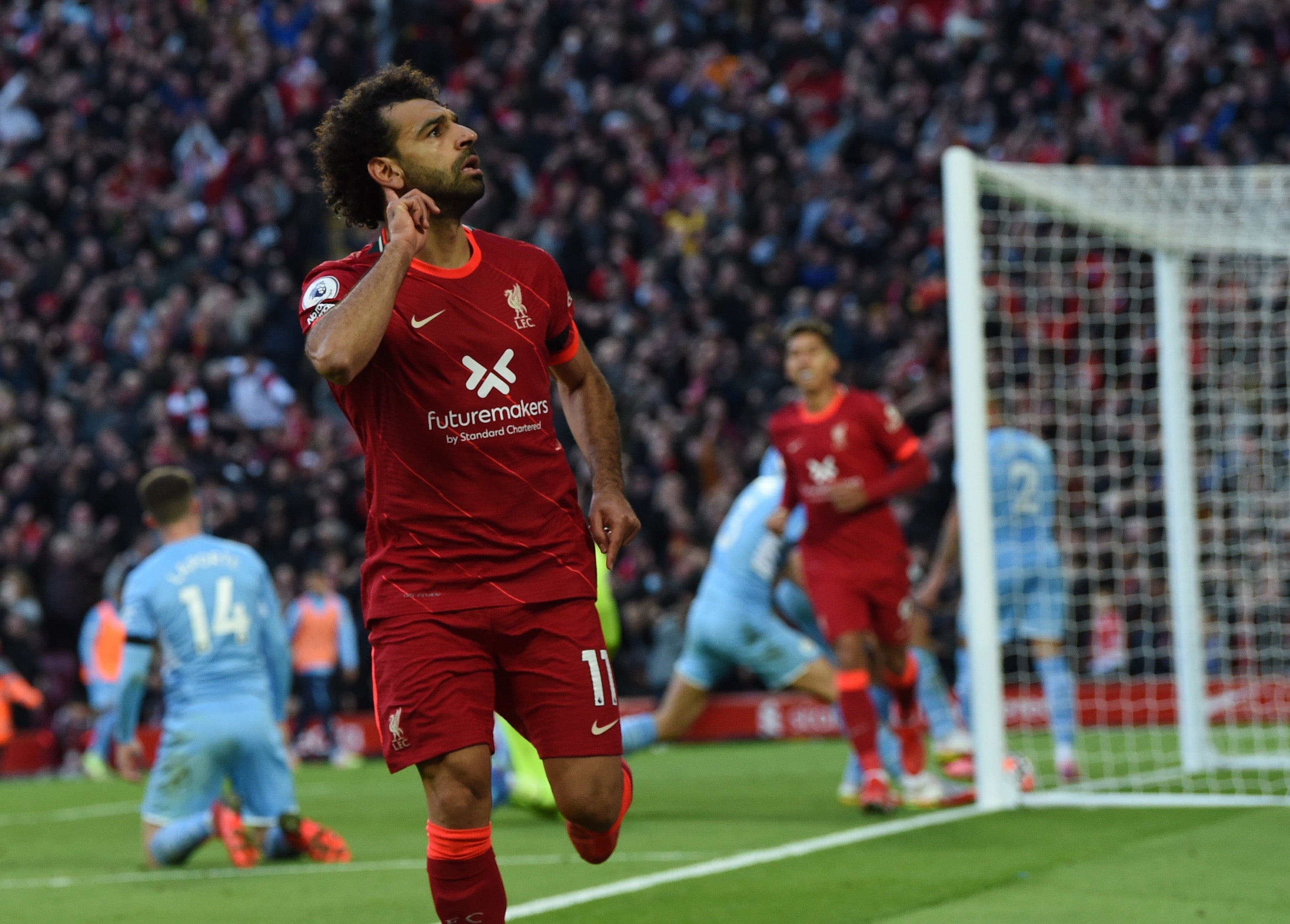 Mohamed Salah celebrates after scoring Liverpool’s equaliser