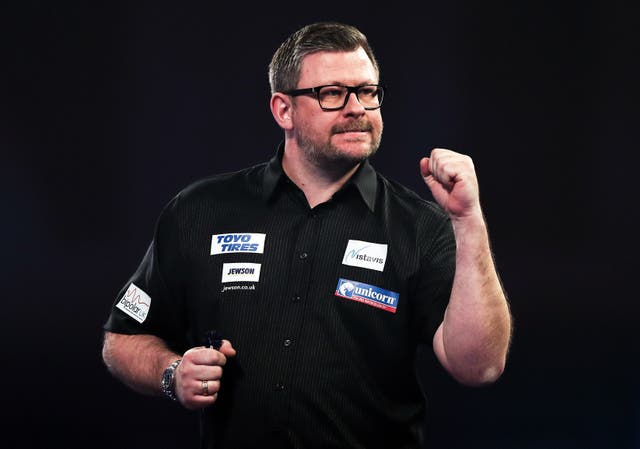 James Wade won a thriller to reach the second round (Kieran Cleeves/PA)