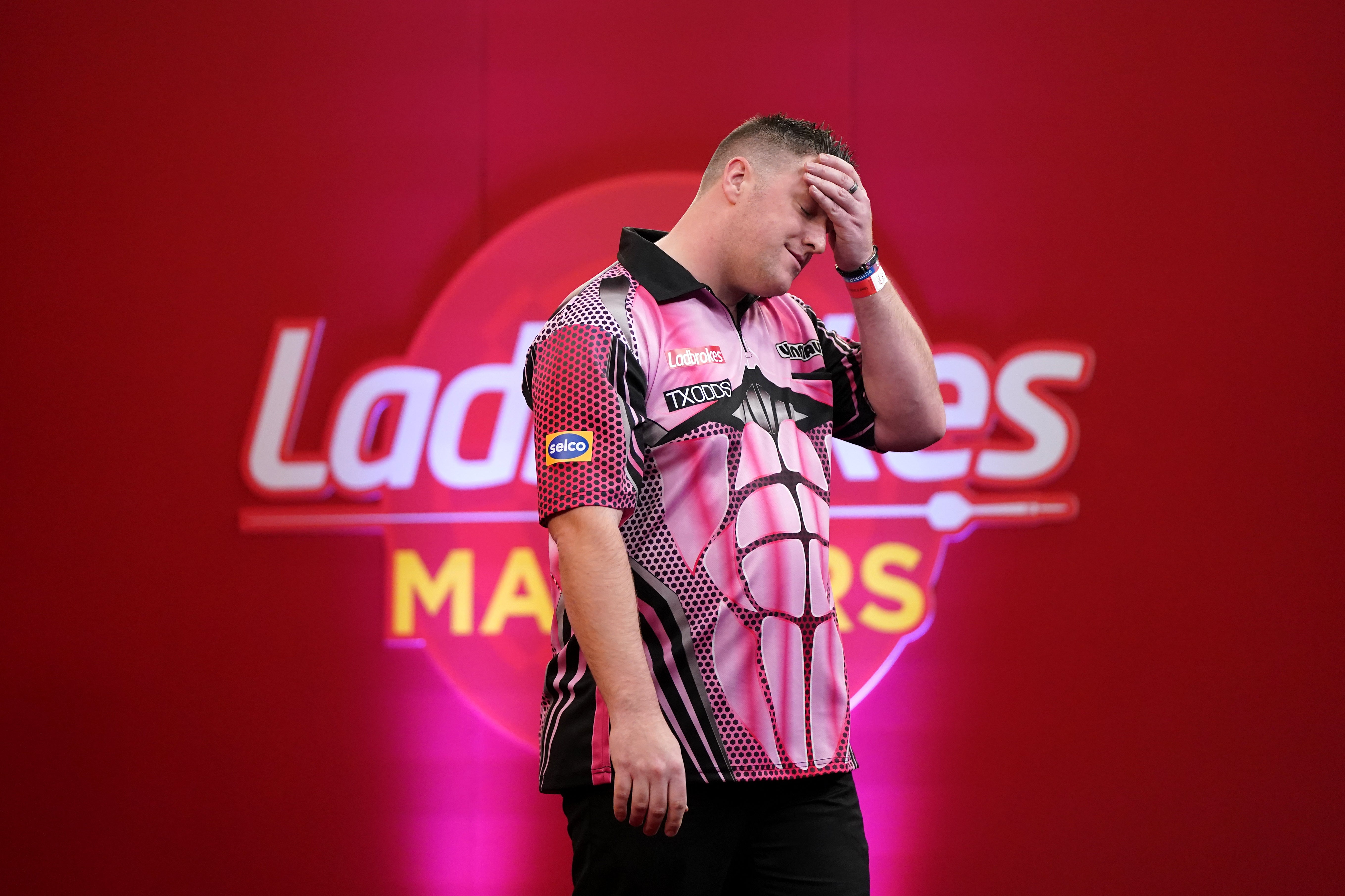 Former champion Daryl Gurney was an early casualty (Zac Goodwin/PA)