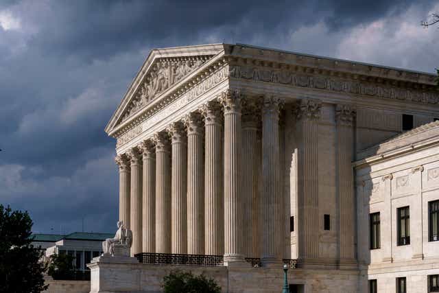 <p>Supreme Court justices are weighing up whether to strike down a New York law restricting where people can carry guns </p>