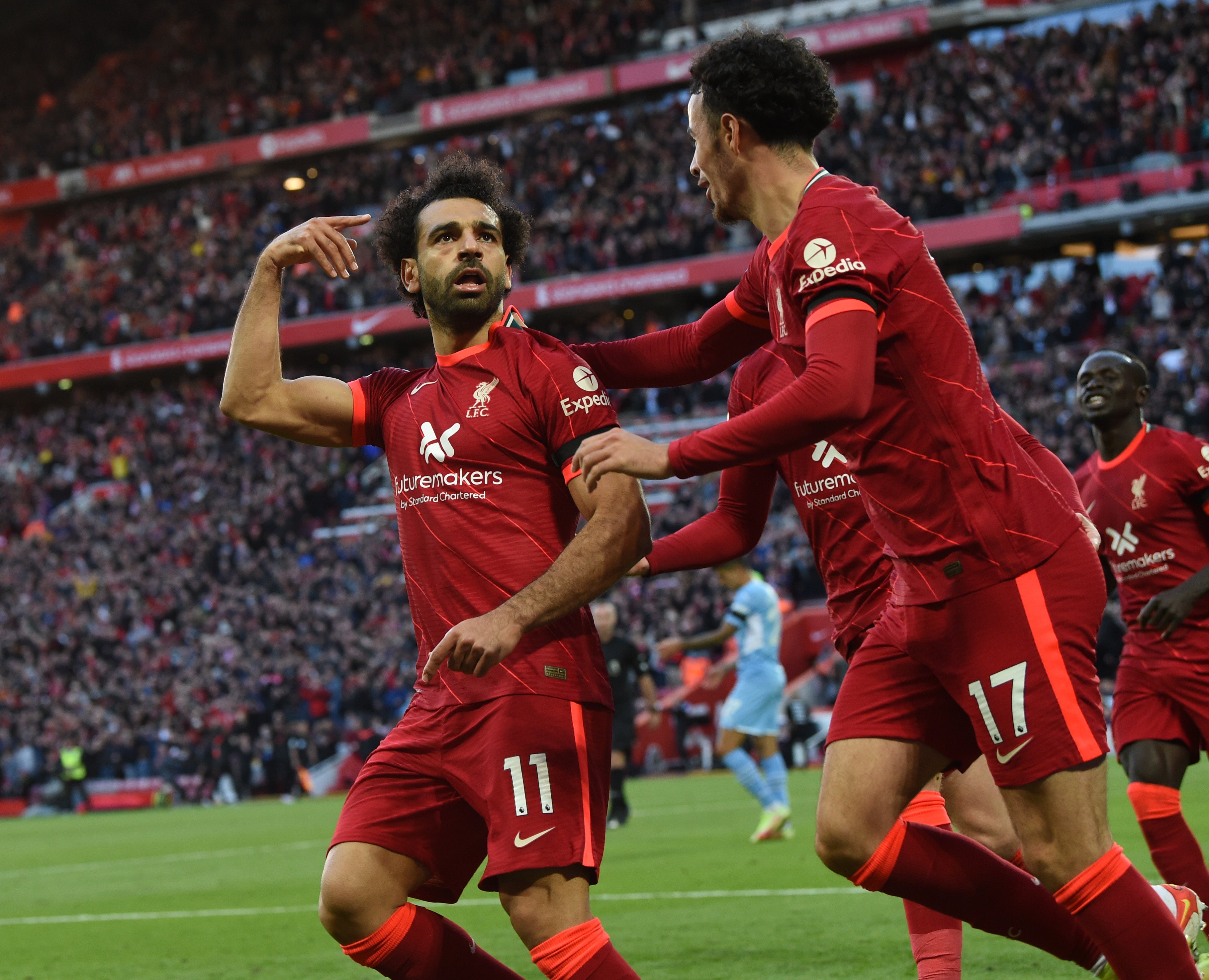 Mohamed Salah celebrates scoring a stunner against Man City