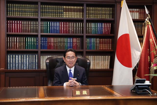 <p>Japans former Foreign Minister Fumio Kishida poses for a photograph following a press conference after winning the ruling Liberal Democratic Party's presidential election</p>