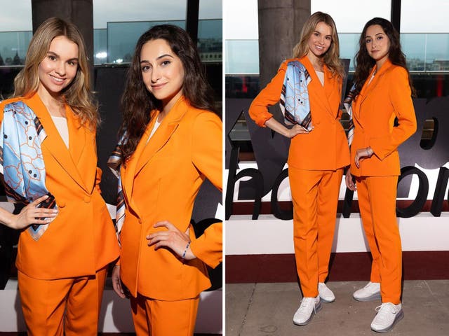 <p>The new SkyUp uniform features a slouchy orange trouser suit and smart white trainers</p>