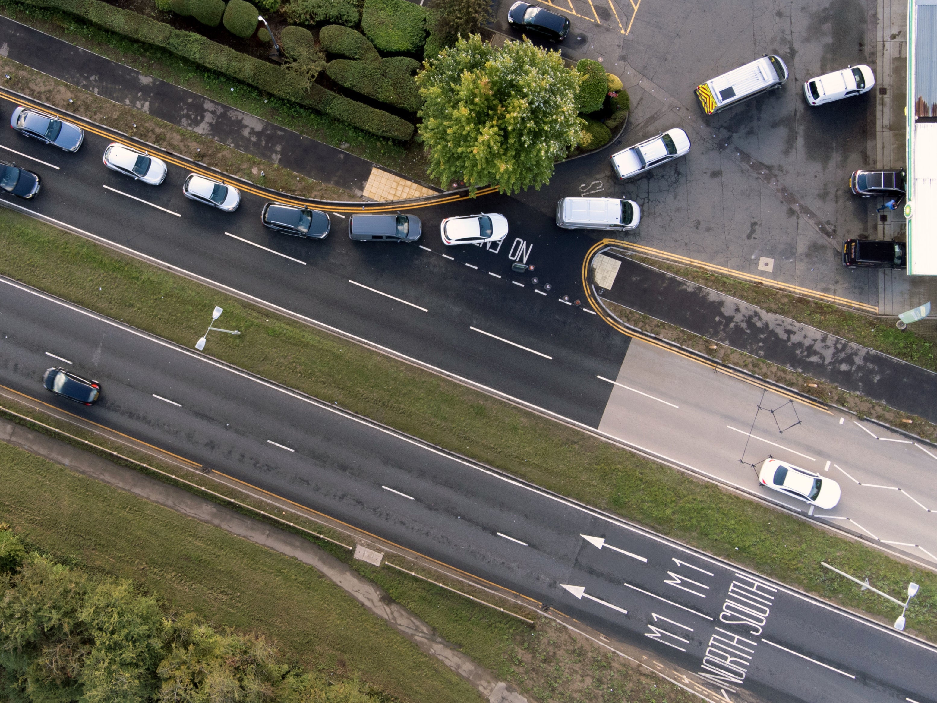 People queue for fuel at a petrol station in Hemel Hempstead