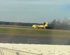 Spirit Airlines plane catches fire after bird flies into one of its engines during take off