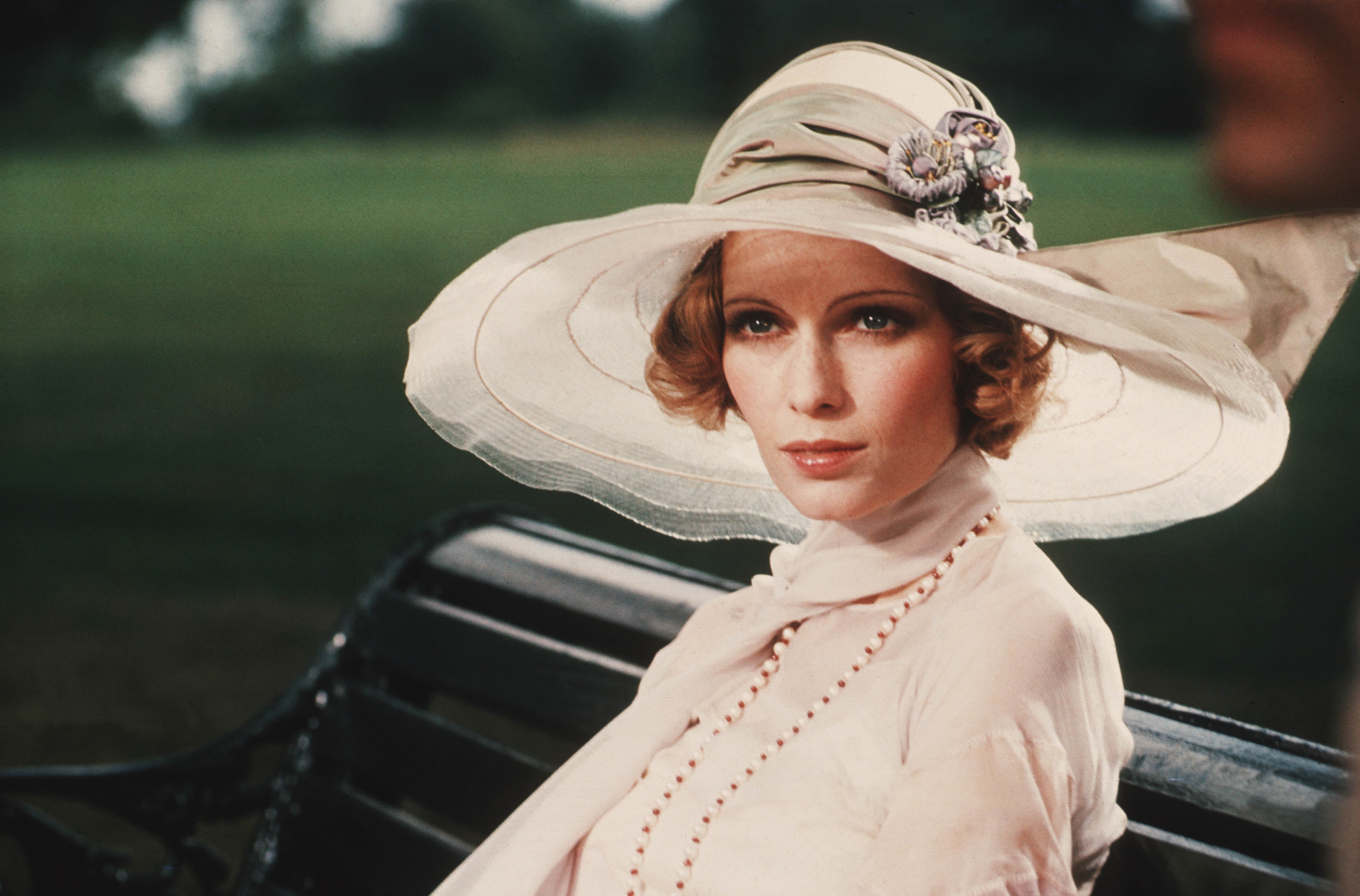 Mia Farrow portrays Daisy Buchanan in the 1974 adaptation of the book