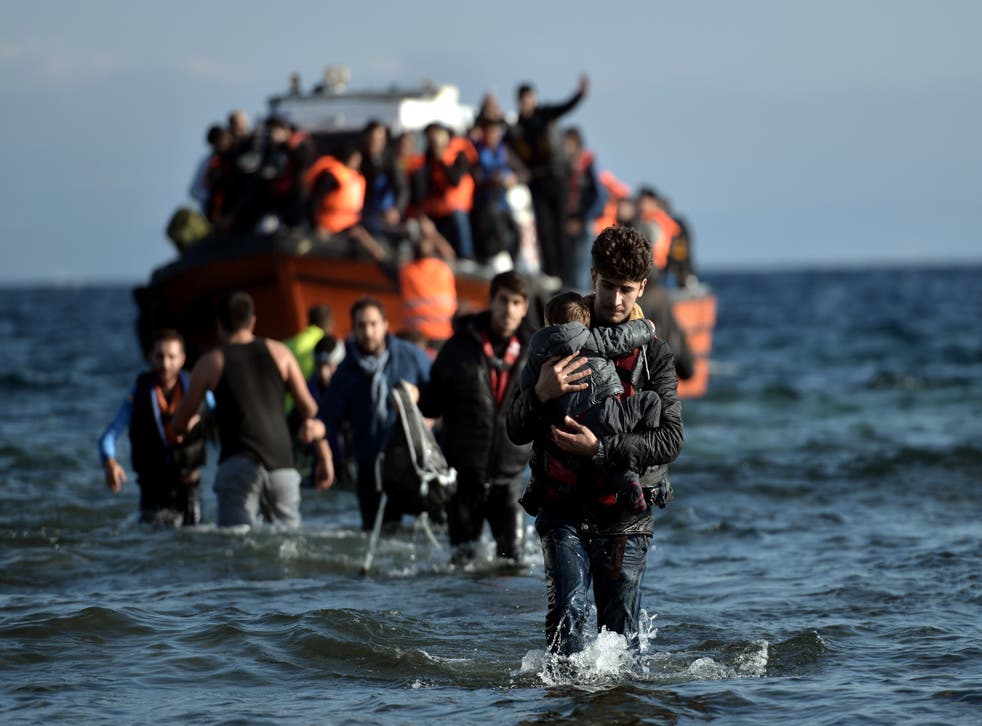 <p>Refugees arrive on Lesbos after crossing the Aegean Sea from Turkey during the 2015 crisis</p>