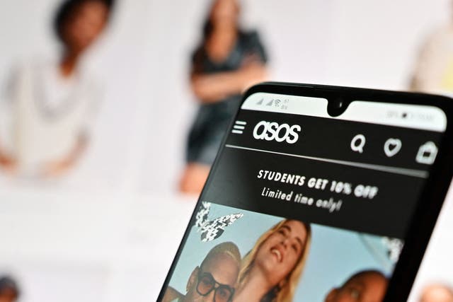 <p>ASOS online website, seen on a mobile phone</p>