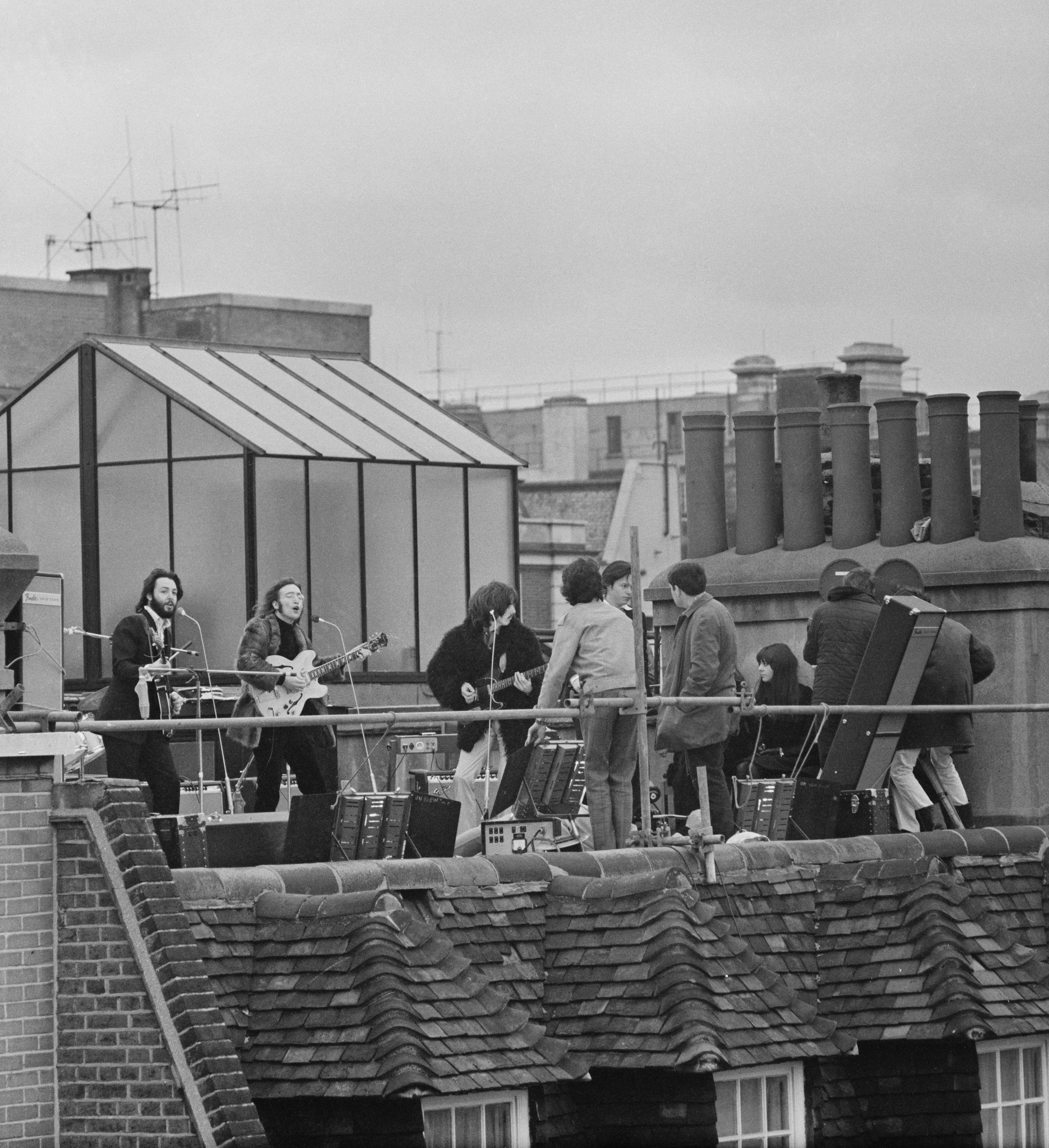 The Beatles performing their last live public concert on 30 January 1969