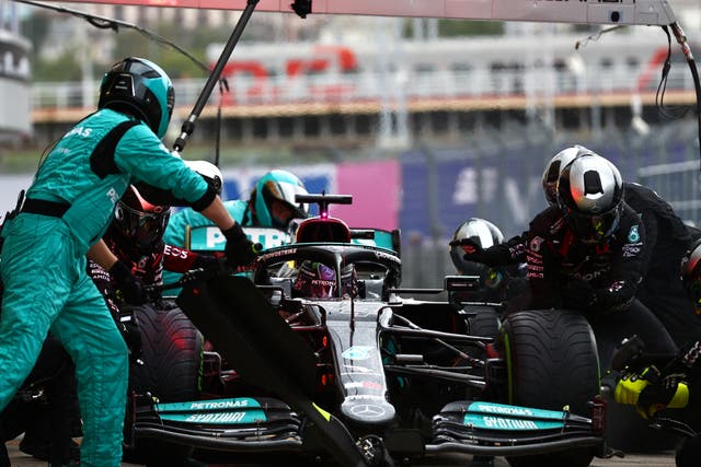 <p>Lewis Hamilton during a pit-stop at the Russian Grand Prix</p>