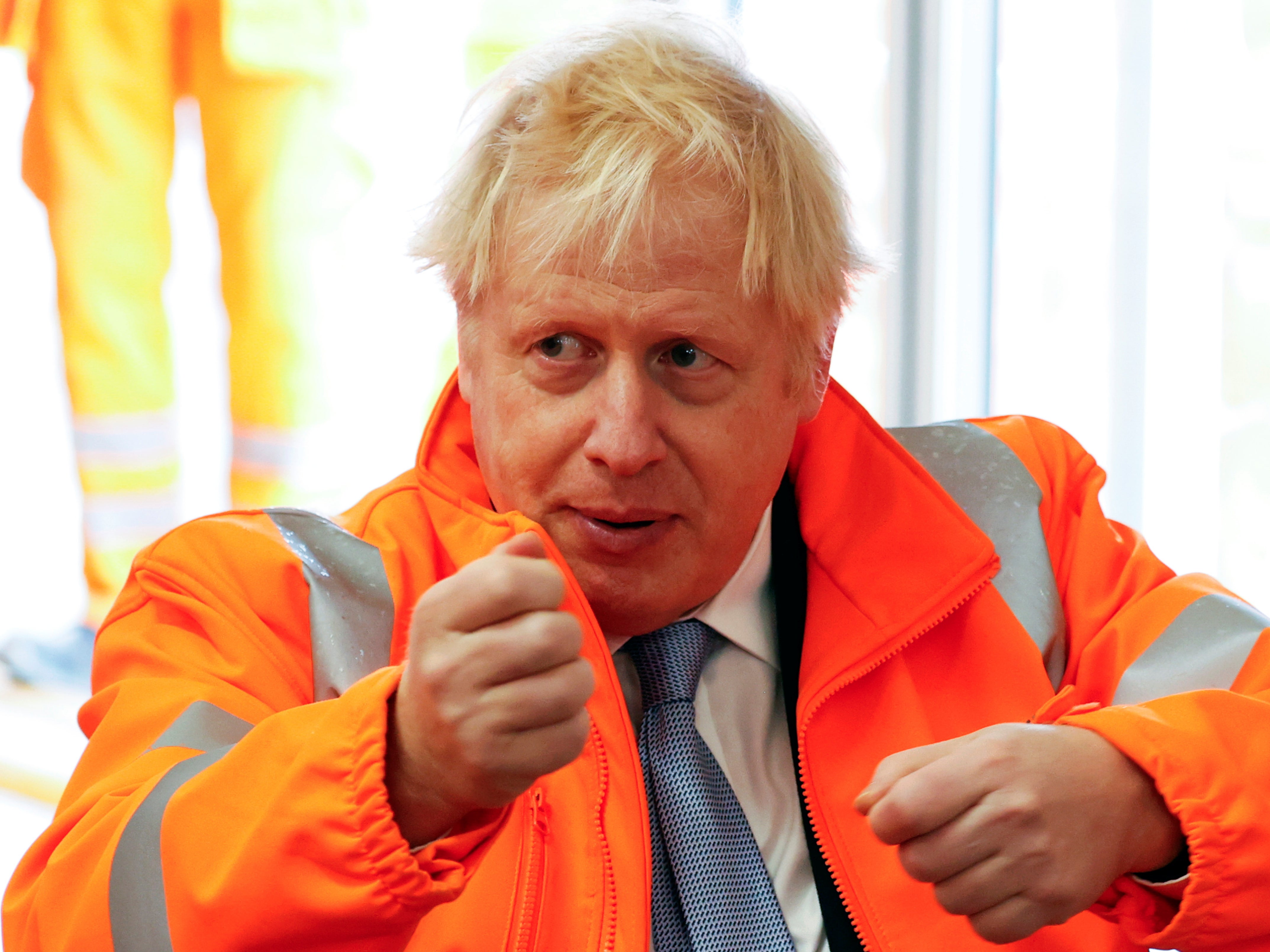 Leading the way, or just a backseat driver? Boris Johnson speaks at a construction site in Manchester on 4 October 2021
