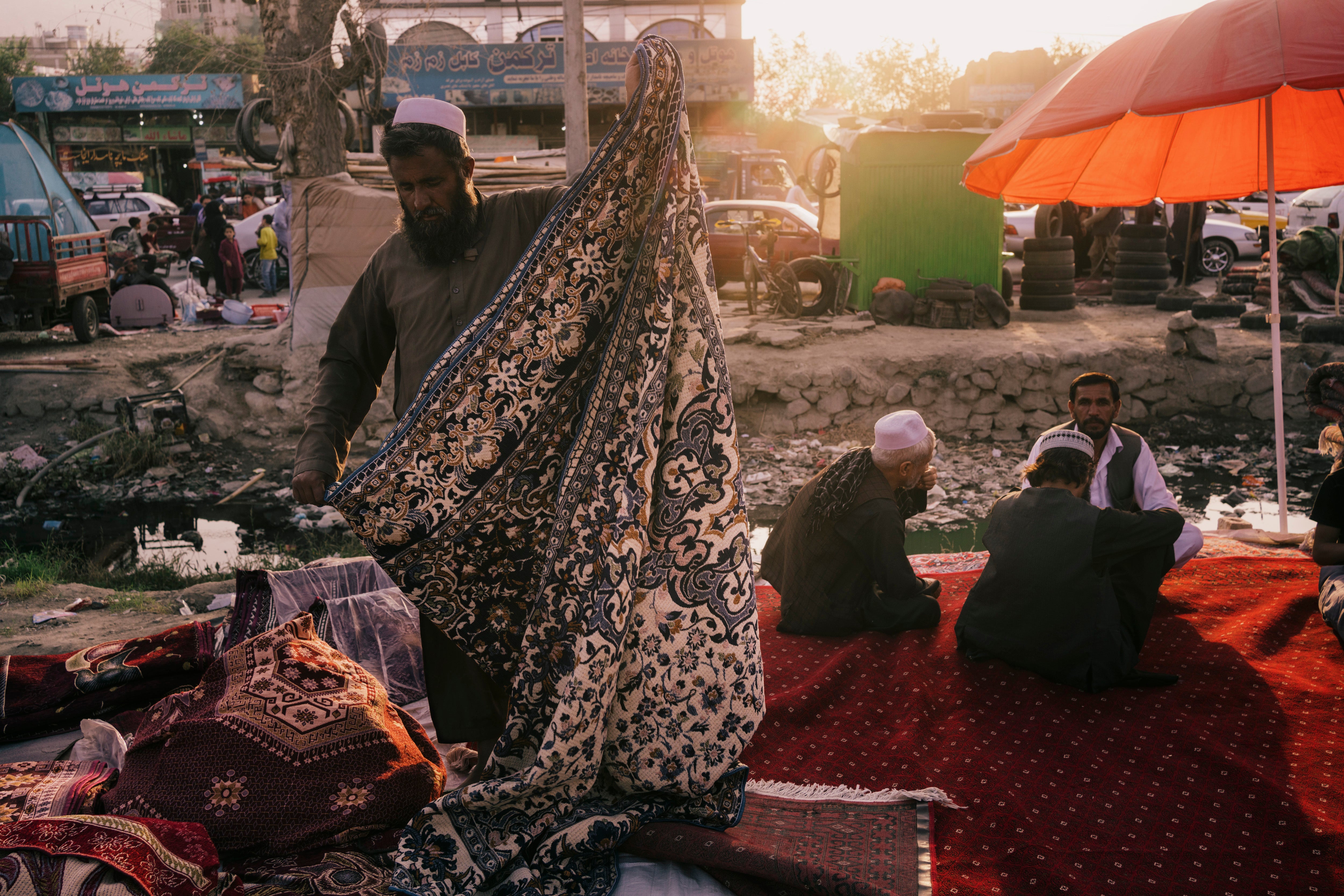 At the market, impoverished families are selling their home appliances and other goods to raise money