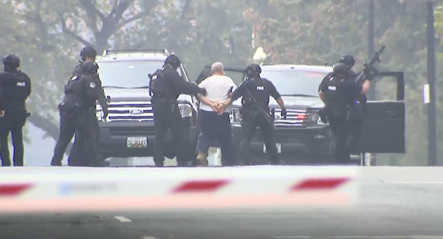 <p>US Capitol Police take a man into custody after extracting from ‘suspicious vehicle’</p>