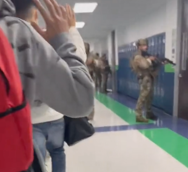 <p>A TikTok shot by a student at a school in Texas shows children evacuating as armed police stand guard</p>