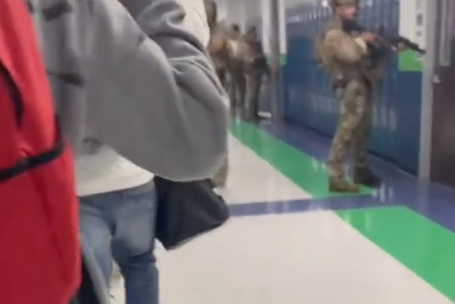 <p>A TikTok shot by a student at a school in Texas shows children evacuating as armed police stand guard</p>