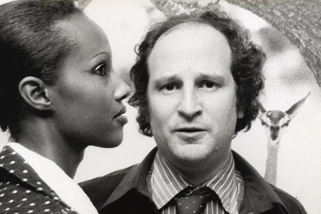 <p>With Iman at Peter Beard’s photo opening in New York, in 1975 </p>