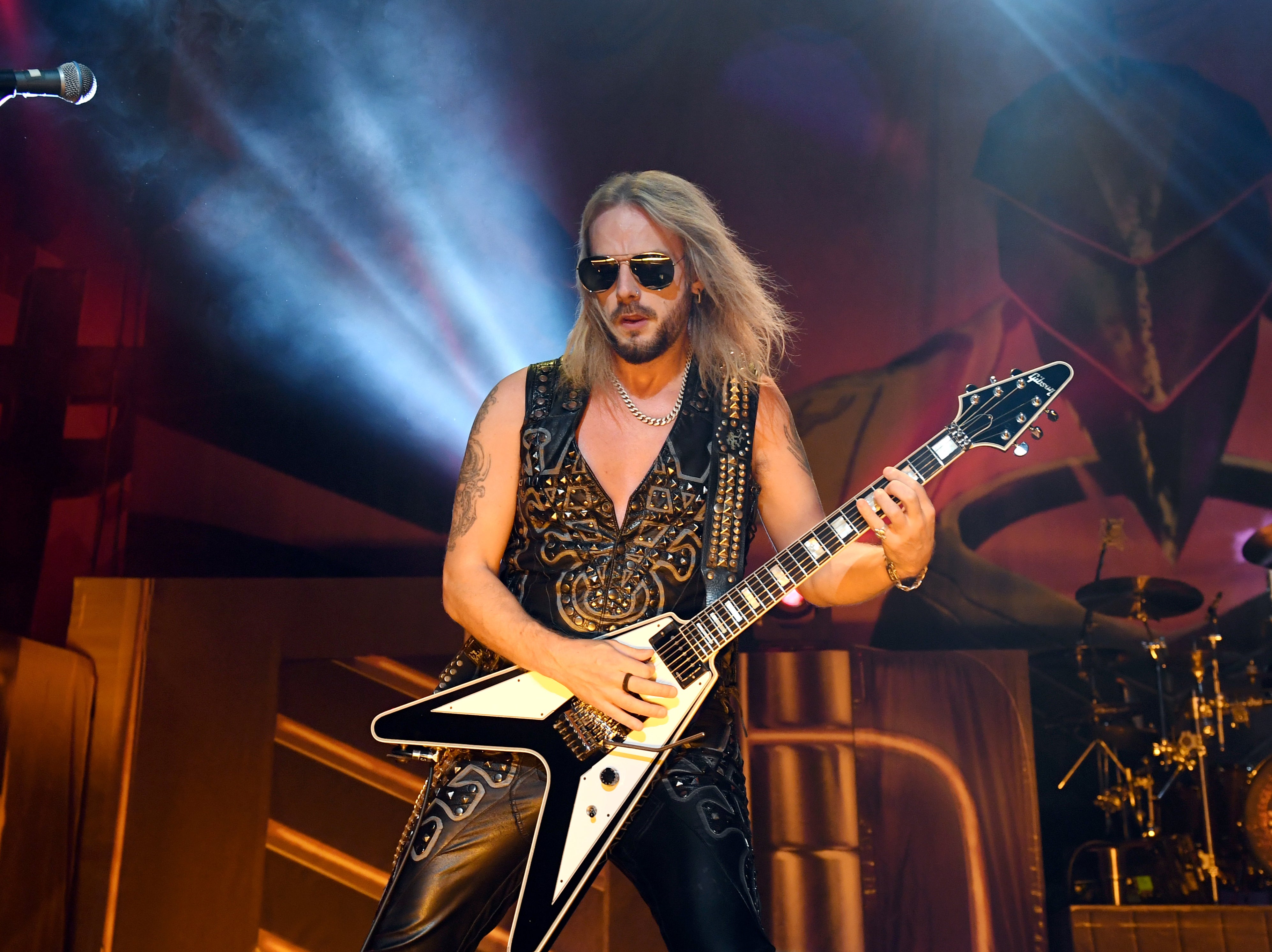 Richie Faulkner performing with Judas Priest in 2019