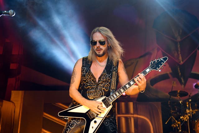 <p>Richie Faulkner performing with Judas Priest in 2019</p>