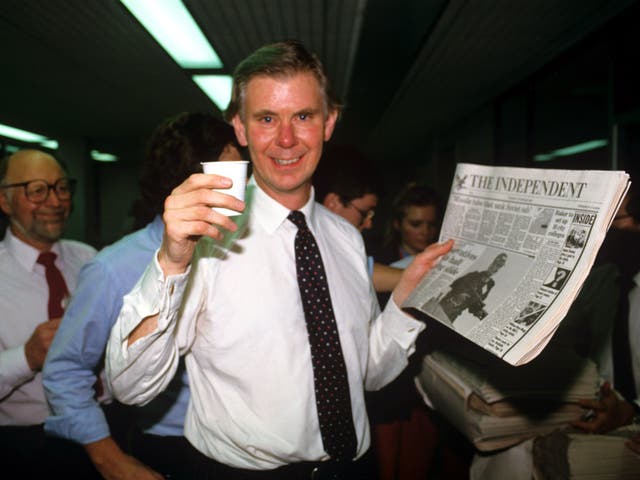 <p>Whittam Smith in the newsroom toasts the first edition on 6 October 1986 </p>