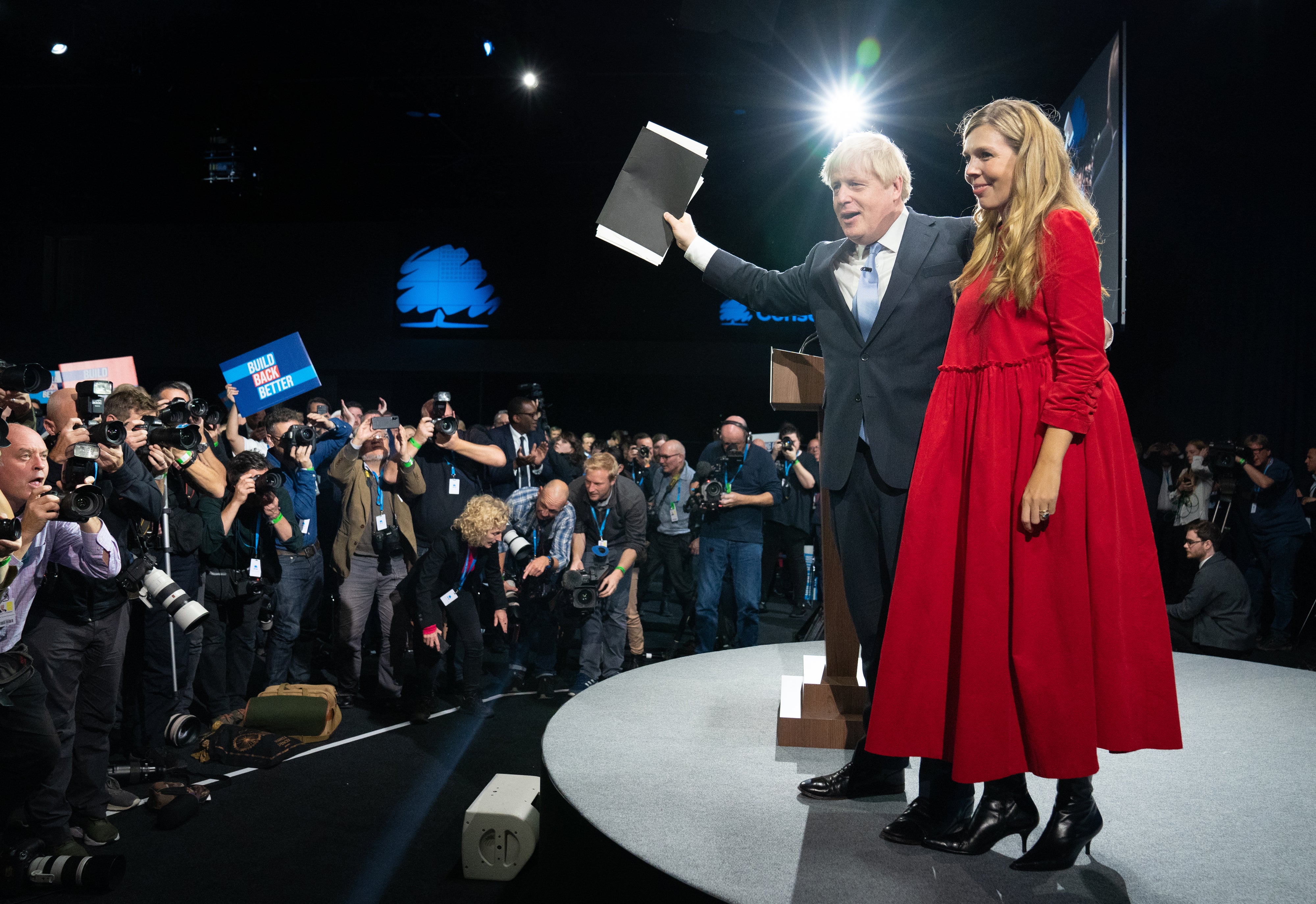 Prime Minister Boris Johnson is joined by his wife Carrie on stage after delivering his keynote speech at the Conservative Party conference in Manchester (Stefan Rousseau/PA)