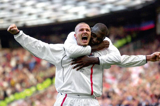 David Beckham celebrates his free-kick against Greece (Phil Noble/PA)