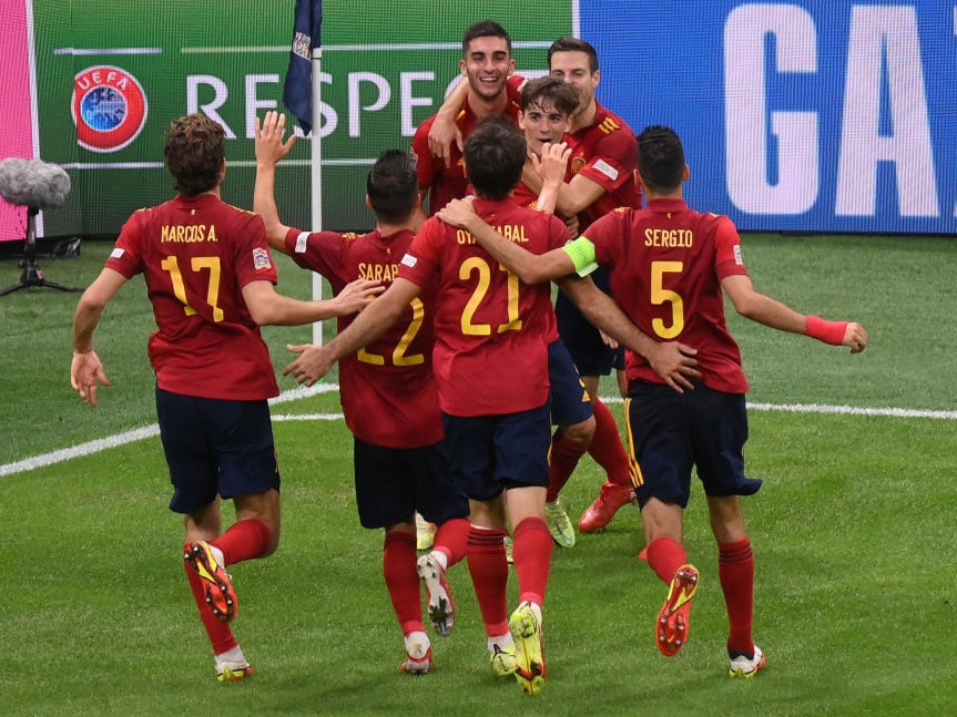 Spain celebrate Ferran Torres’ second goal
