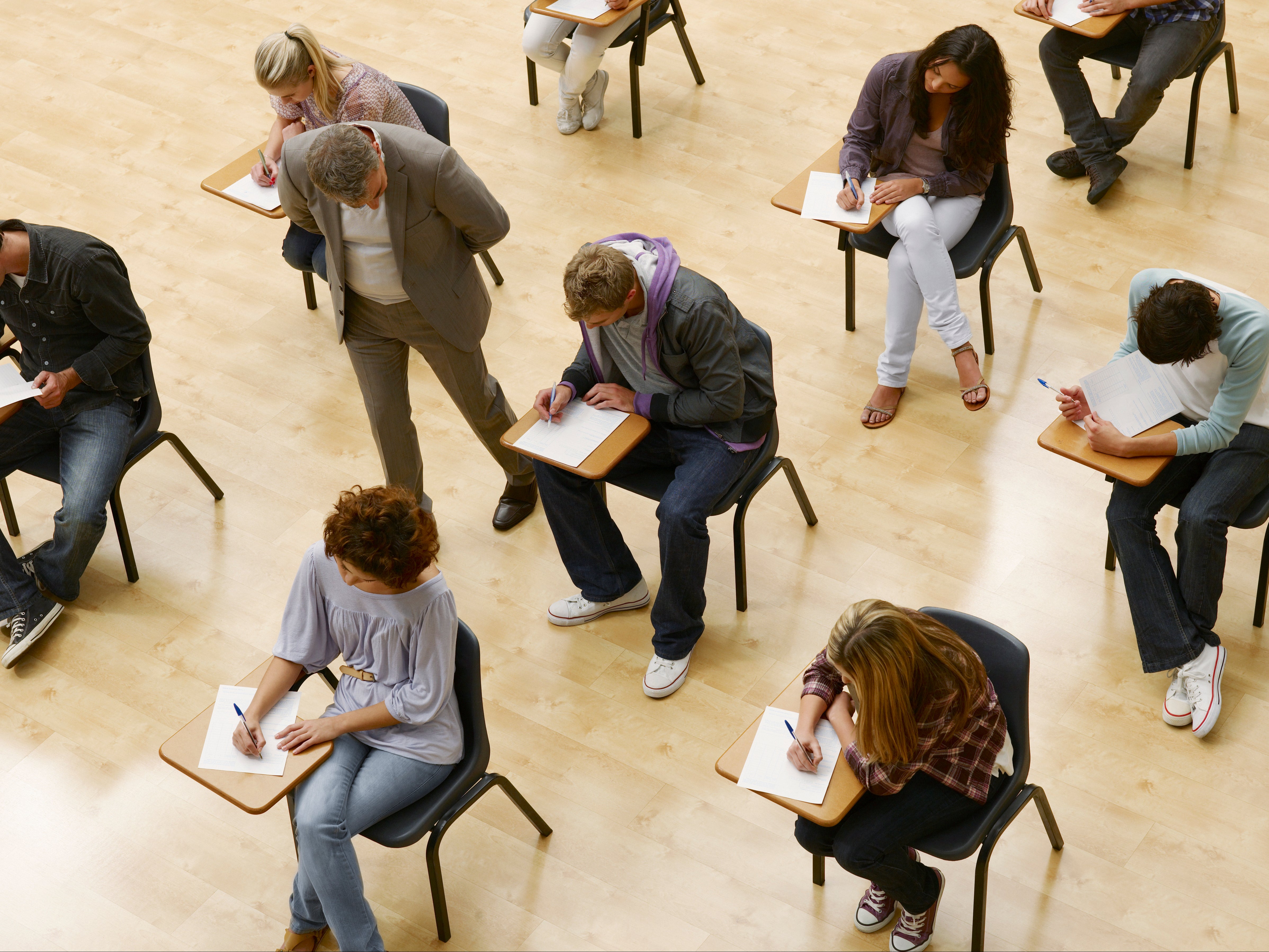 Universities should consider grammar when marking exams, according to England’s higher education regulator