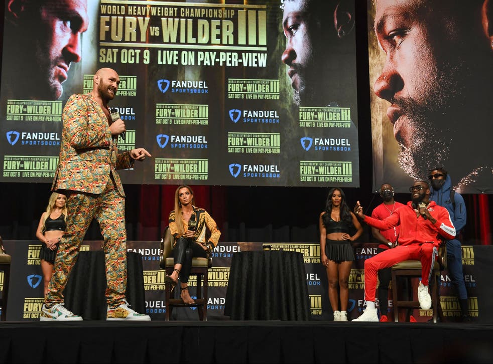 <p>Tyson Fury and Deontay Wilder met face to face at the press conference </p>