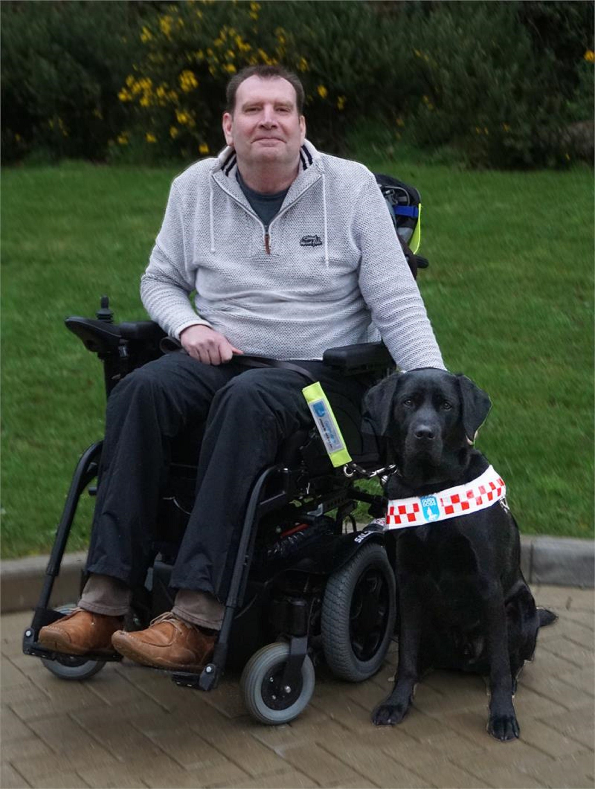 Police are hunting for a man who allegedly kicked Nicholas Bateman’s guide dog Angus in Plymouth