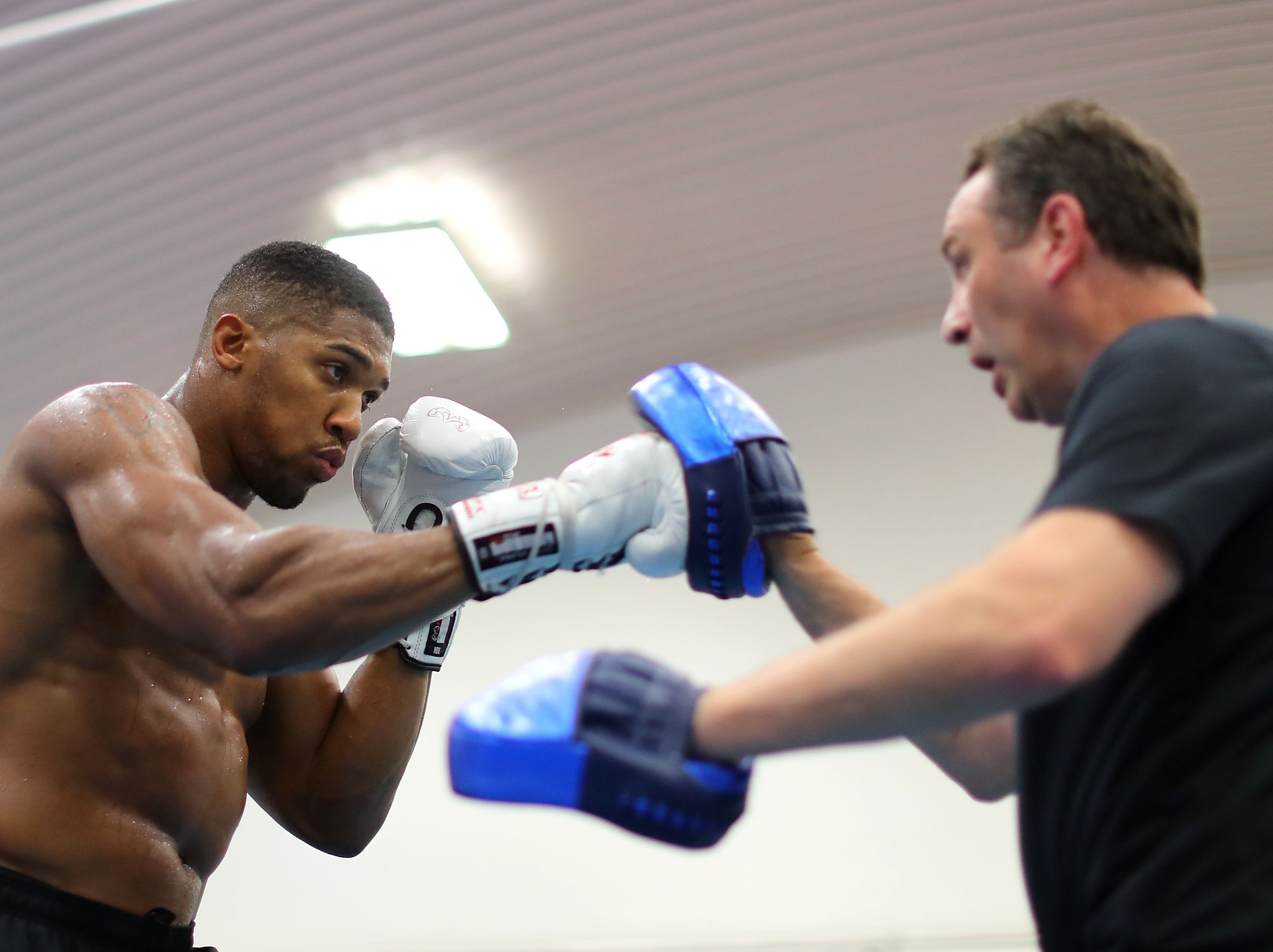 Anthony Joshua works out with his head coach Rob McCracken