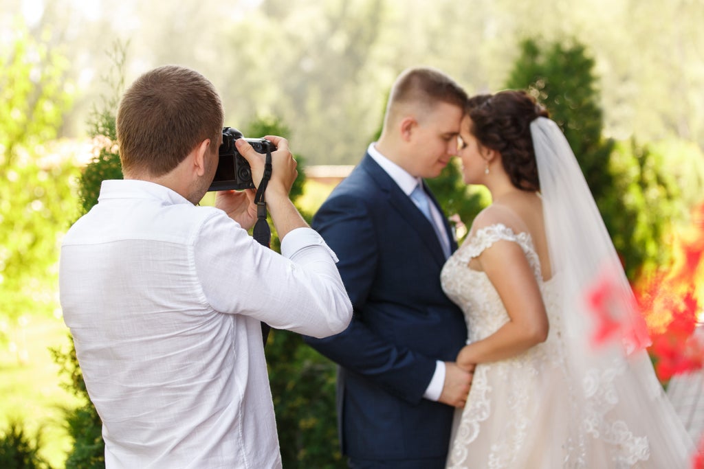 Photographer deletes couple’s wedding photos after being denied break to eat and drink
