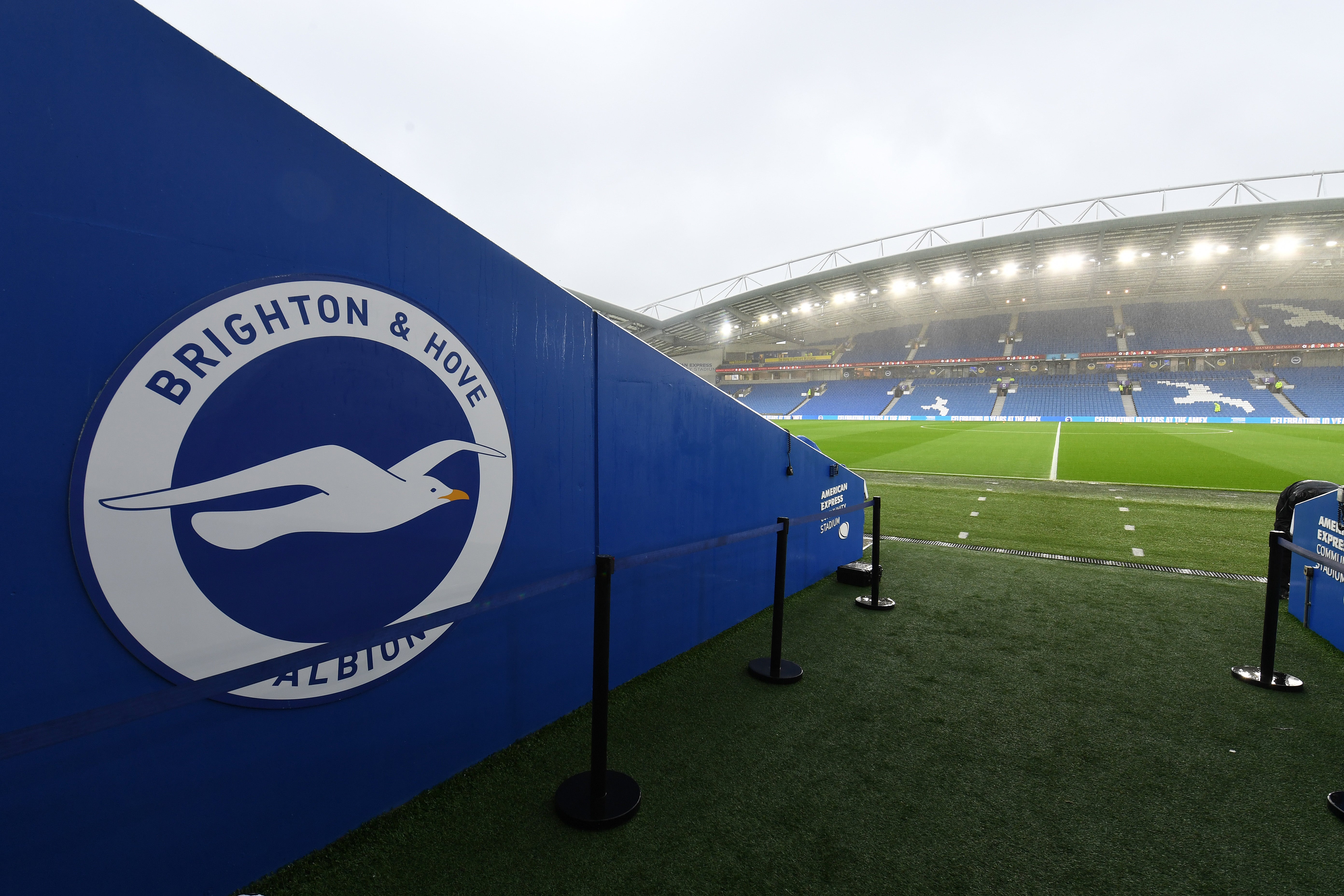 A Brighton footballer has been arrested on suspicion of sexual assault