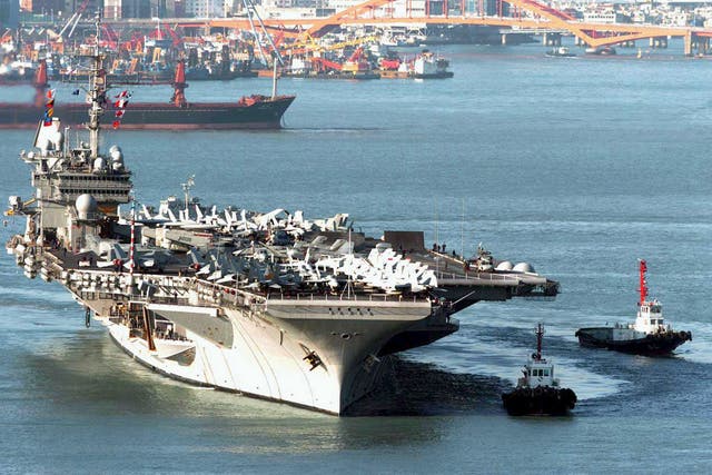 <p>USS Kitty Hawk entering the port of Busan in 2005</p>