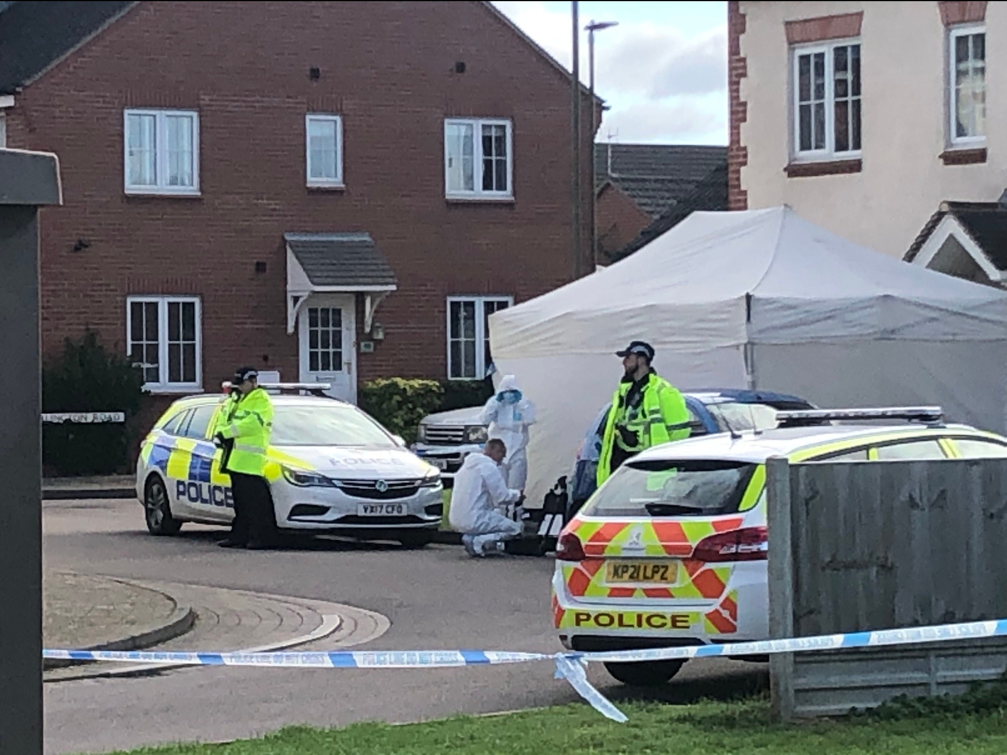 Police activity at Snowdonia Road, Walton Cardiff, after one man died and another suffered serious injuries